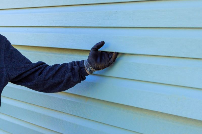 Customer Installing Siding